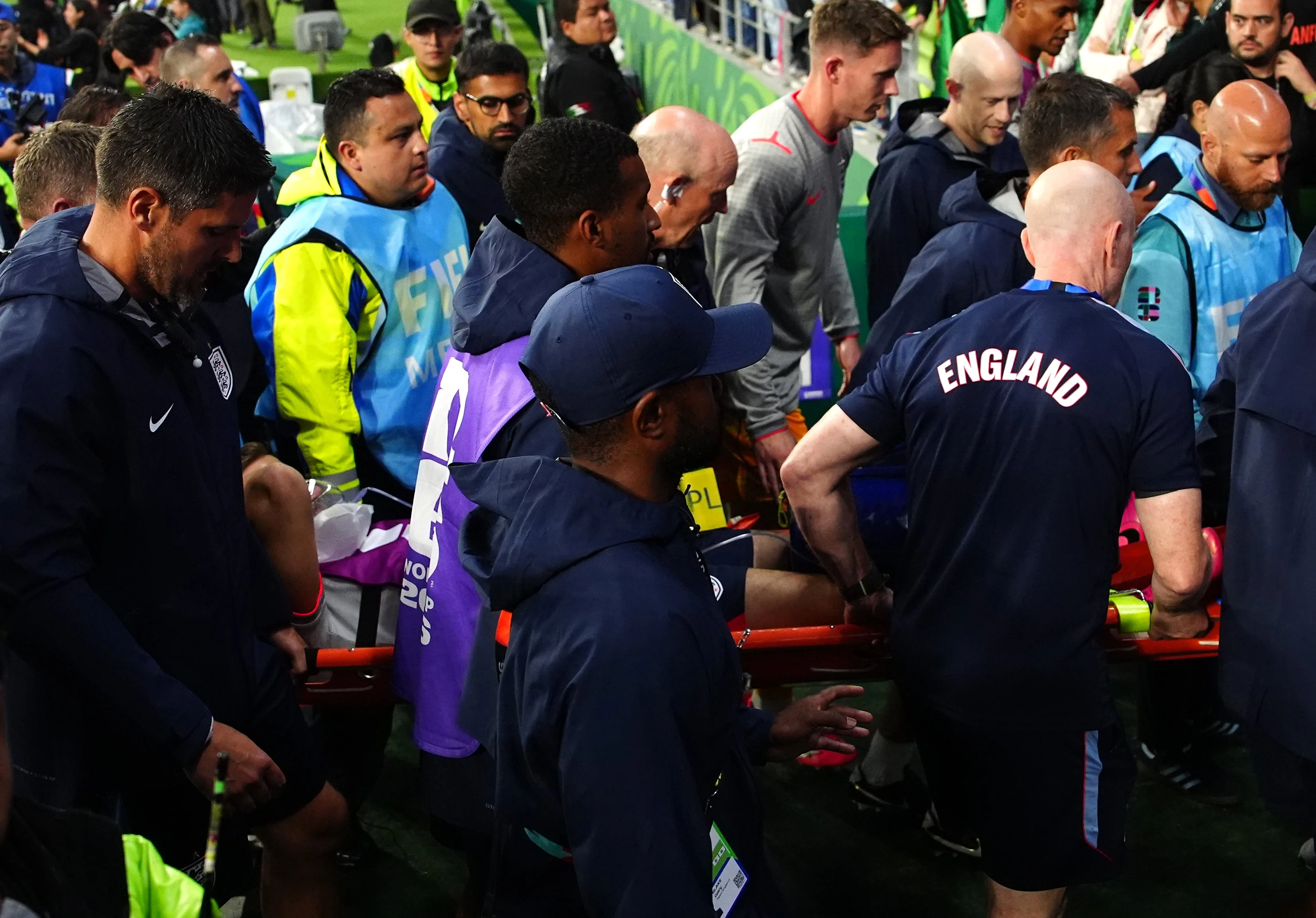 Jordan Henderson was stretchered away after breaking his arm