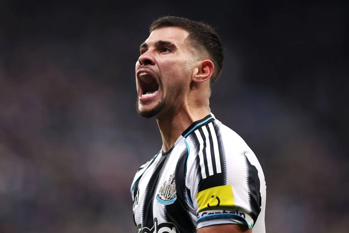 Bruno Guimaraes celebrates his team's fourth goal, scored by teammate Harvey Barnes during the Premier League match between Newcastle United and Leeds United at St James' Park.