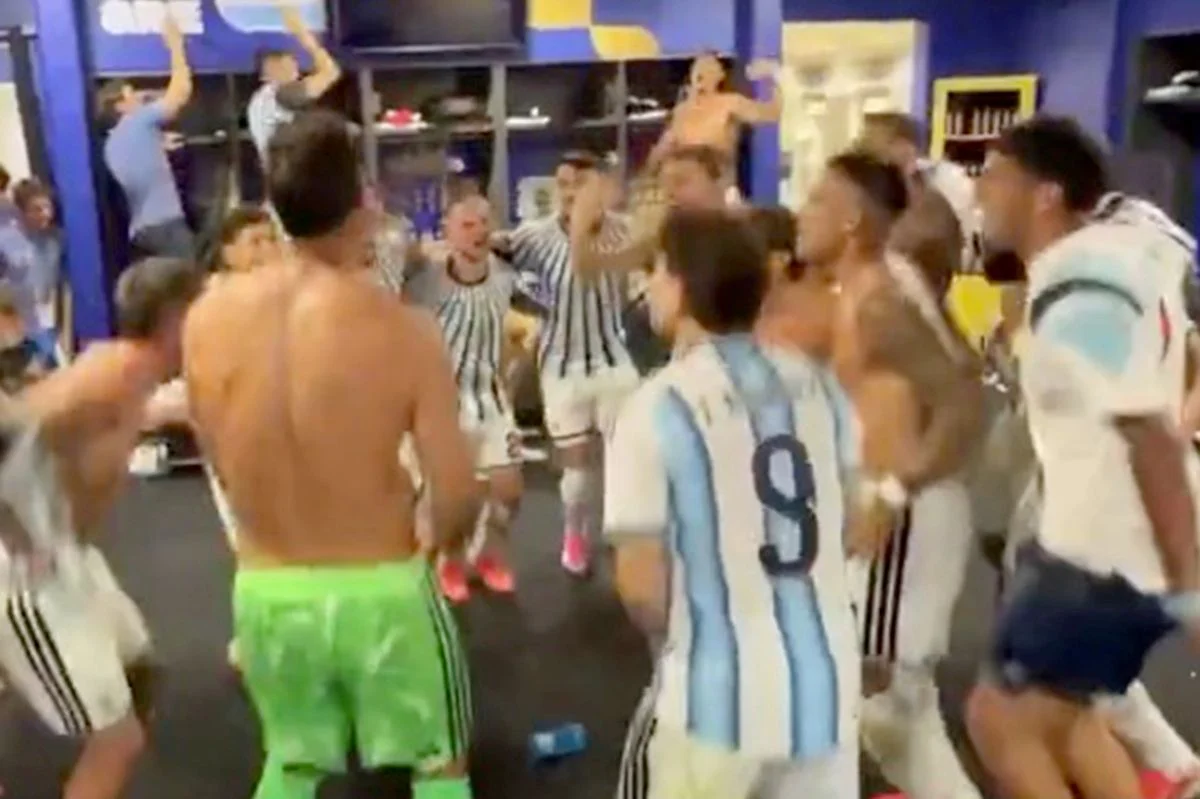 Argentina players singing in a dressing room