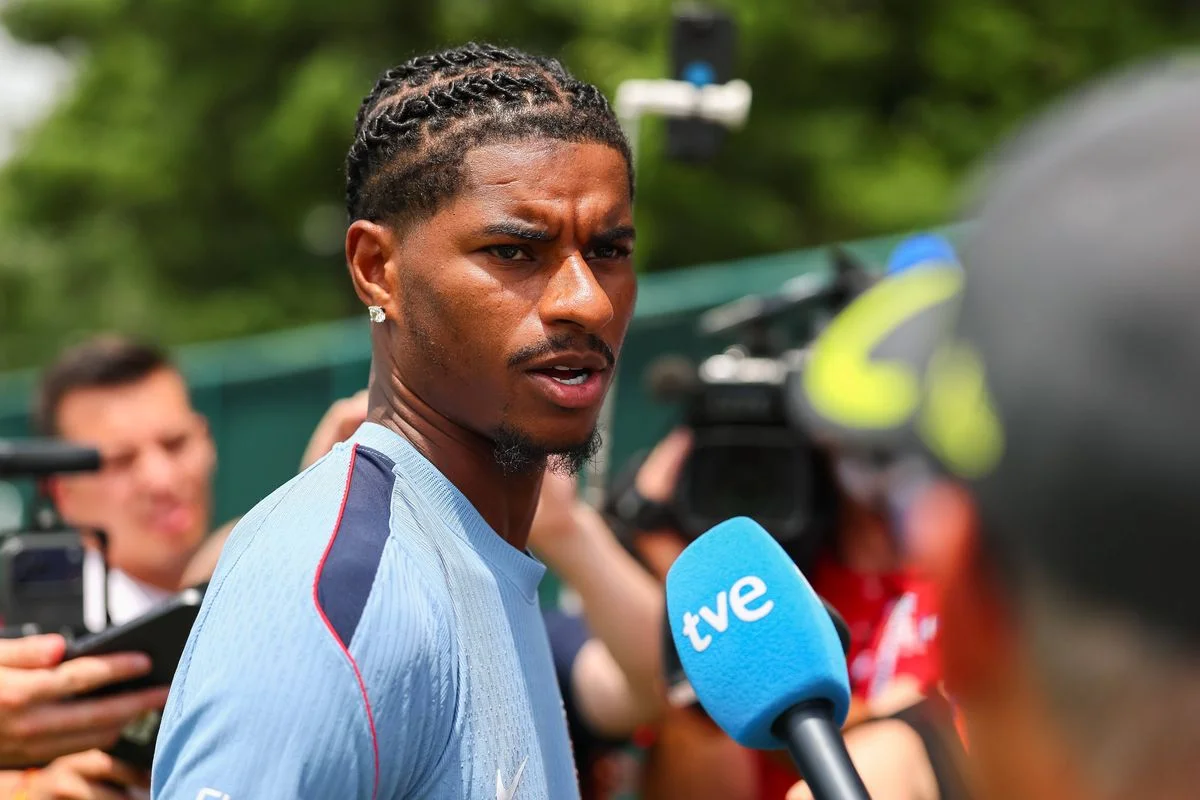 Marcus Rashford speaks to the media during a press conference. 