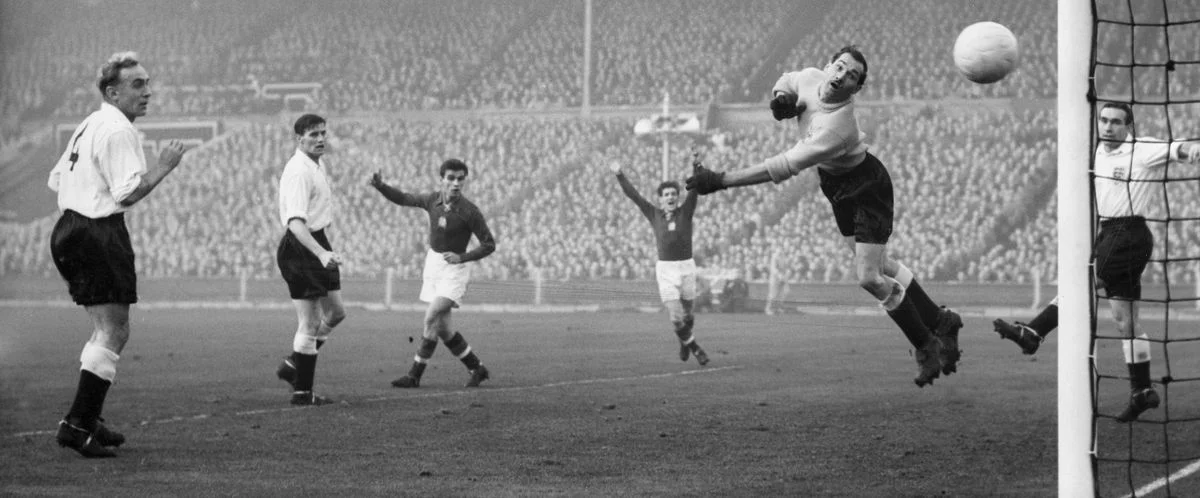 Both Billy Wright and Alf Ramsey as Hungary score