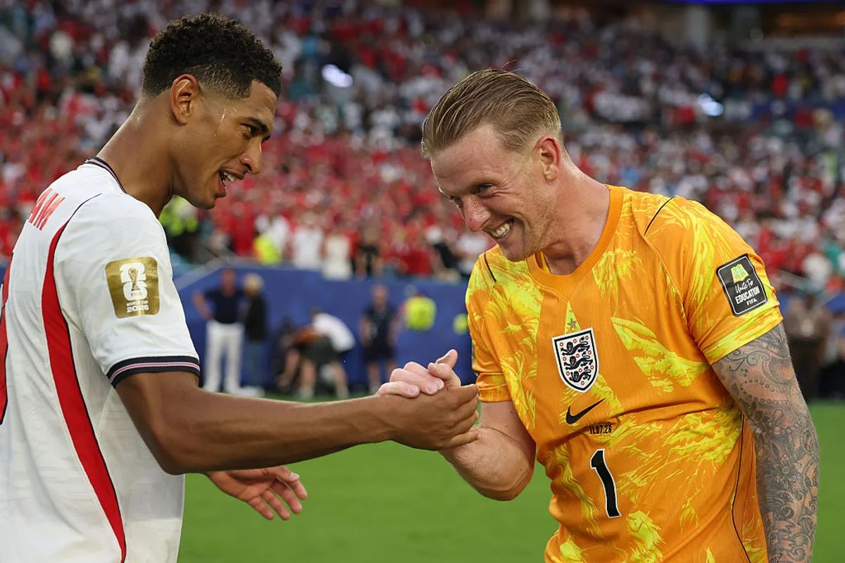 Jude Bellingham and Jordan Pickford (Photo by Patrick Smith - FIFA/FIFA via Getty Images)