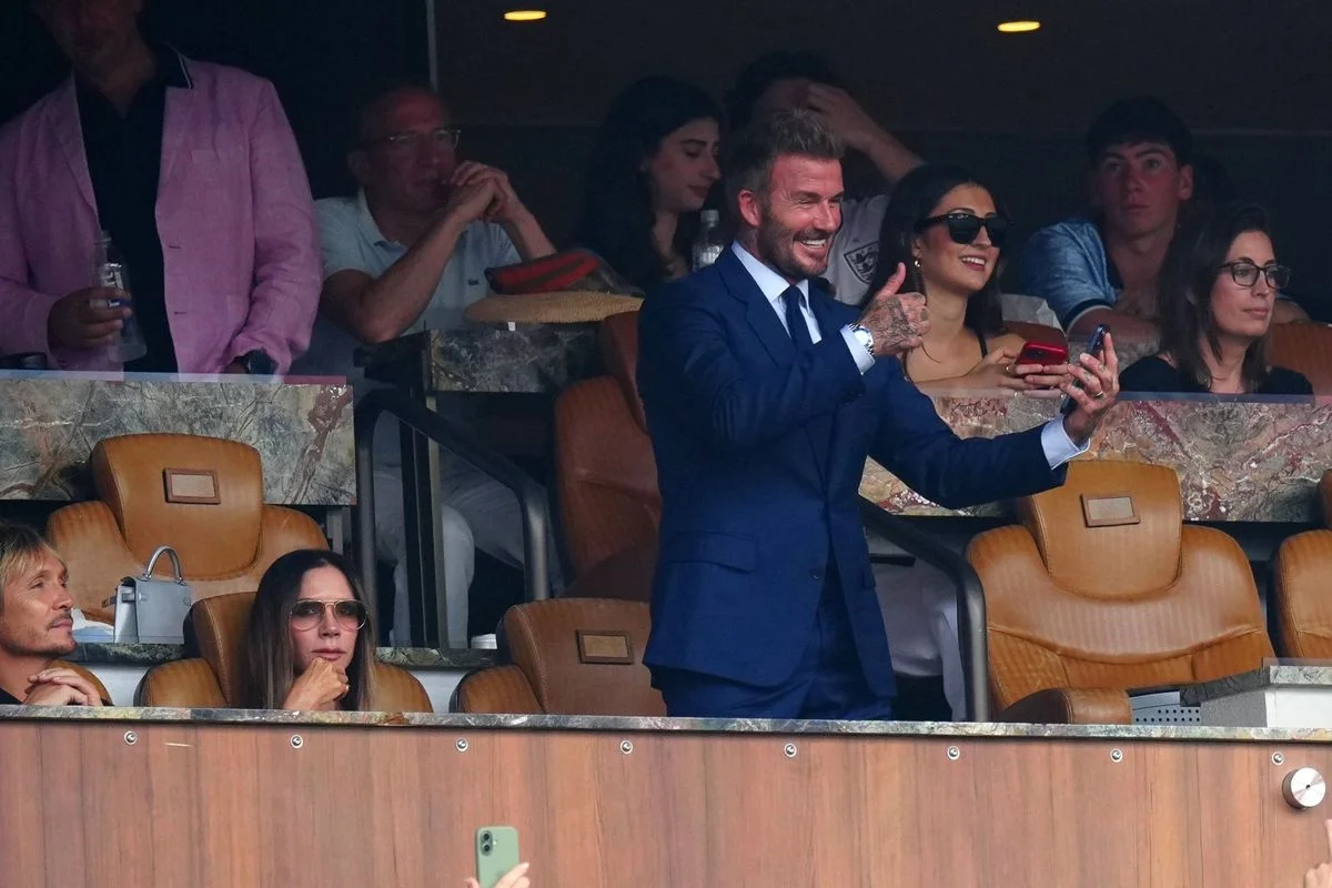 David Beckham and Victoria Beckham ahead of kick-off