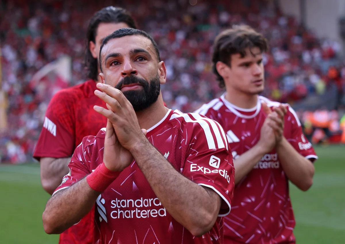 Mohamed Salah of Liverpool appears emotional as he applauds the fans following his final appearance for the club during the Premier League match between Liverpool and Brentford at Anfield