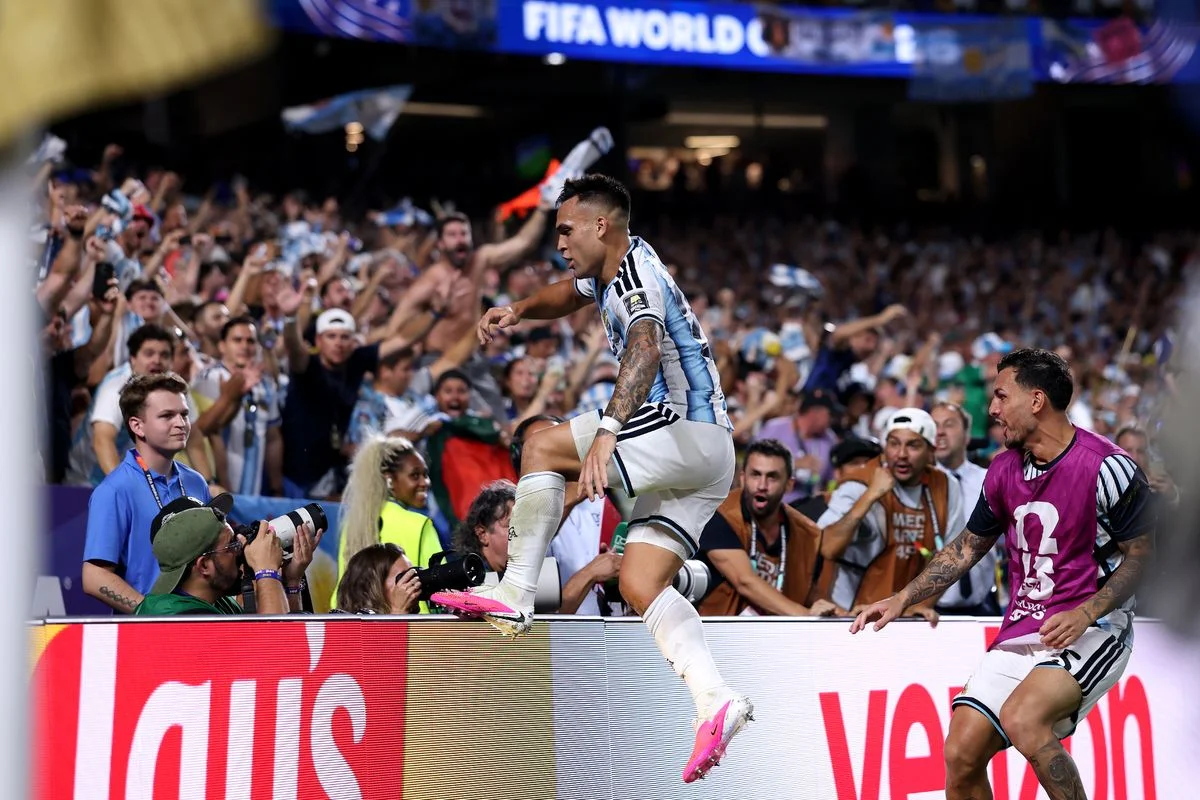 Lautaro Martinez celebrates scoring his team's third goal during the FIFA World Cup 2026 Quarter Final match between Argentina and Switzerland. 