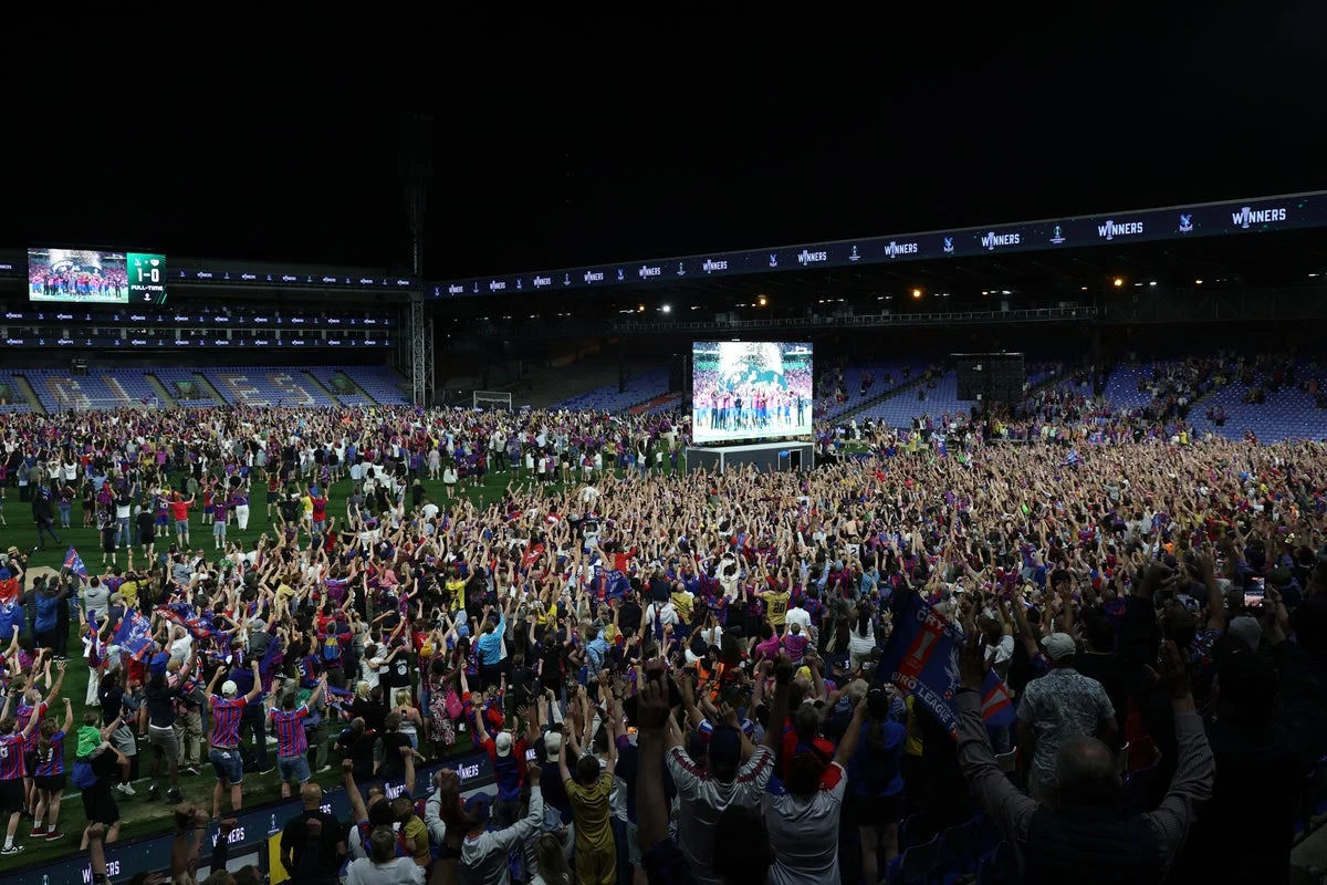Euphoric Crystal Palace fans storm Selhurst Park pitch after historic Conference League win
